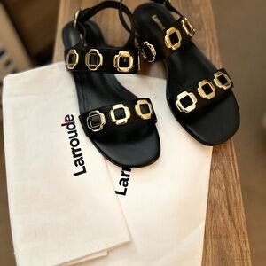 Larroude Milan Flat Sandal In Black Leather